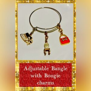 NWT ADJUSTABLE BANGLE WITH BOUGIE CHARMS